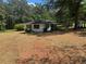 Charming home with a well-maintained lawn and mature trees at 1272 Cave Springs Rd, Douglasville, GA 30134