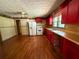 Kitchen featuring hardwood floors and a gas range at 1272 Cave Springs Rd, Douglasville, GA 30134