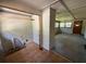 Spacious living room showing flooring and closet area. Natural light from the windows at 1272 Cave Springs Rd, Douglasville, GA 30134