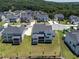 Aerial view showcasing a modern home's backyard and neighborhood from above at 2996 Treeside Ter, Marietta, GA 30066