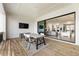 Spacious deck with seating area, outdoor TV, and seamless flow into the indoor living space through sliding glass doors at 2996 Treeside Ter, Marietta, GA 30066