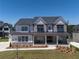 Stunning two-story home featuring stone accents, black trim, and a welcoming front porch at 2996 Treeside Ter, Marietta, GA 30066