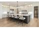 Modern kitchen with stainless steel appliances, large island, and stylish bar stool seating at 2996 Treeside Ter, Marietta, GA 30066