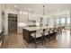 Spacious kitchen with a large center island, stainless steel appliances, and bar stool seating at 2996 Treeside Ter, Marietta, GA 30066