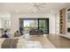 Bright living room with a sliding glass doors opening to a view, fireplace, and hardwood floors at 2996 Treeside Ter, Marietta, GA 30066