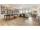 Bright living room featuring custom bookshelves, stylish furniture, and hardwood floors, creating a comfortable living space at 2996 Treeside Ter, Marietta, GA 30066