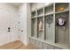 Mudroom with built-in storage cubbies, drawers, and coat hooks for organized entry and exit, blending style and function at 2996 Treeside Ter, Marietta, GA 30066