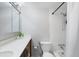 Well-lit bathroom with a combo tub and shower, modern fixtures, and a vanity with generous counter space at 46 Ivy Ne Rdg, Atlanta, GA 30342
