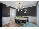 Dining room with modern lighting, stylish decor, and views of the yard at 46 Ivy Ne Rdg, Atlanta, GA 30342
