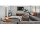 Inviting living room with modern decor, gray sofa, hardwood floors, and ample natural light at 46 Ivy Ne Rdg, Atlanta, GA 30342