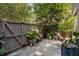 Cozy patio with privacy fence, charming decor, and plenty of greenery at 46 Ivy Ne Rdg, Atlanta, GA 30342
