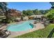 Outdoor swimming pool surrounded by lounge chairs and lush greenery, perfect for relaxation and recreation at 46 Ivy Ne Rdg, Atlanta, GA 30342