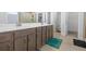 Spacious bathroom featuring double sinks, modern fixtures, and ample storage space at 55 Clubhouse Way, Acworth, GA 30101