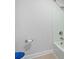 Bright bathroom featuring a tiled shower/tub and a modern toilet at 55 Clubhouse Way, Acworth, GA 30101