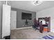 Bedroom with desk, chair and large television at 55 Clubhouse Way, Acworth, GA 30101