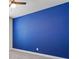 Bright bedroom features ceiling fan with light fixture and blue accent wall at 55 Clubhouse Way, Acworth, GA 30101