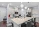 Kitchen with gray cabinets, pendant lighting, a microwave, and stainless steel appliances at 55 Clubhouse Way, Acworth, GA 30101