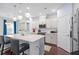 Kitchen with gray cabinets, pendant lighting, hardwood floors and stainless steel appliances at 55 Clubhouse Way, Acworth, GA 30101