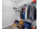 Walk-in closet with shelving filled with clothes, providing ample storage at 55 Clubhouse Way, Acworth, GA 30101