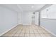 Finished basement has closet, neutral walls, and tiled flooring, offering flexible living and storage options at 3210 Roseheath Ln, Lithonia, GA 30038