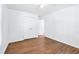 Spacious bedroom with hardwood floors and ample closet space at 3210 Roseheath Ln, Lithonia, GA 30038