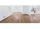 Bright living room with hardwood floors, neutral walls and an open layout at 3210 Roseheath Ln, Lithonia, GA 30038