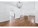 Open-concept living space with hardwood floors and great flow between rooms at 3210 Roseheath Ln, Lithonia, GA 30038