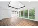 Sunroom with large windows and a skylight, offering ample natural light at 3210 Roseheath Ln, Lithonia, GA 30038
