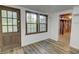 Finished basement with door, windows, and a peek into unfinished area at 3352 Northbrook Dr, Atlanta, GA 30340