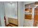 Charming half bath boasting a marble vanity top and stylish accents next to the kitchen at 3352 Northbrook Dr, Atlanta, GA 30340