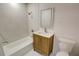 Renovated bathroom with modern vanity, white tiles and new fixtures at 3352 Northbrook Dr, Atlanta, GA 30340