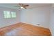 Inviting bedroom with hardwood floors, a ceiling fan, and ample natural light at 3352 Northbrook Dr, Atlanta, GA 30340