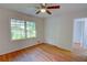 Comfortable bedroom with hardwood floors, a window, and closet at 3352 Northbrook Dr, Atlanta, GA 30340
