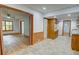 Open kitchen showcases wood cabinets, and transitions to a large living space at 3352 Northbrook Dr, Atlanta, GA 30340