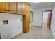 The laundry room has ample cabinet space and washer/dryer hookups at 3352 Northbrook Dr, Atlanta, GA 30340