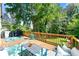 Relaxing back deck featuring a seating area and a great view of the backyard at 3977 Fox Glen Dr, Woodstock, GA 30189