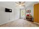 Cozy bedroom with closet and a TV, offering a relaxing retreat at 3977 Fox Glen Dr, Woodstock, GA 30189
