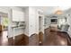Inviting entryway showcasing hardwood floors and access to the kitchen and living area at 3977 Fox Glen Dr, Woodstock, GA 30189