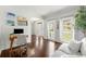 Bright living room with a desk, hardwood floors, natural light, and an inviting atmosphere at 3977 Fox Glen Dr, Woodstock, GA 30189