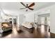 Bright and open floor plan with a living room that leads to the kitchen and back patio at 3977 Fox Glen Dr, Woodstock, GA 30189