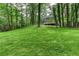Back of the house with large backyard, ideal for outdoor living and recreation at 4806 Deer Chase, Powder Springs, GA 30127