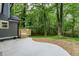 Backyard patio features a natural landscape and lush lawn at 4806 Deer Chase, Powder Springs, GA 30127