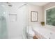 Bright bathroom showcasing a glass-enclosed shower and soaking tub with a large window at 4806 Deer Chase, Powder Springs, GA 30127
