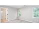 Clean bedroom featuring neutral walls, and access to the bathroom with glass shower at 4806 Deer Chase, Powder Springs, GA 30127