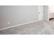 Carpeted bedroom features a door to the bathroom at 4806 Deer Chase, Powder Springs, GA 30127