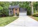Charming two-story home with brick accents and a well-manicured lawn at 4806 Deer Chase, Powder Springs, GA 30127