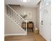 Welcoming foyer with a staircase, natural lighting, and stylish decor creates a warm and inviting atmosphere at 4806 Deer Chase, Powder Springs, GA 30127