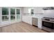 Updated kitchen with white cabinets, stainless steel appliances, and modern finishes at 4806 Deer Chase, Powder Springs, GA 30127