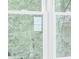 Window overlooking green trees at 4806 Deer Chase, Powder Springs, GA 30127
