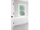 White window looking over lush green trees in a neutrally painted room with white trim at 4806 Deer Chase, Powder Springs, GA 30127